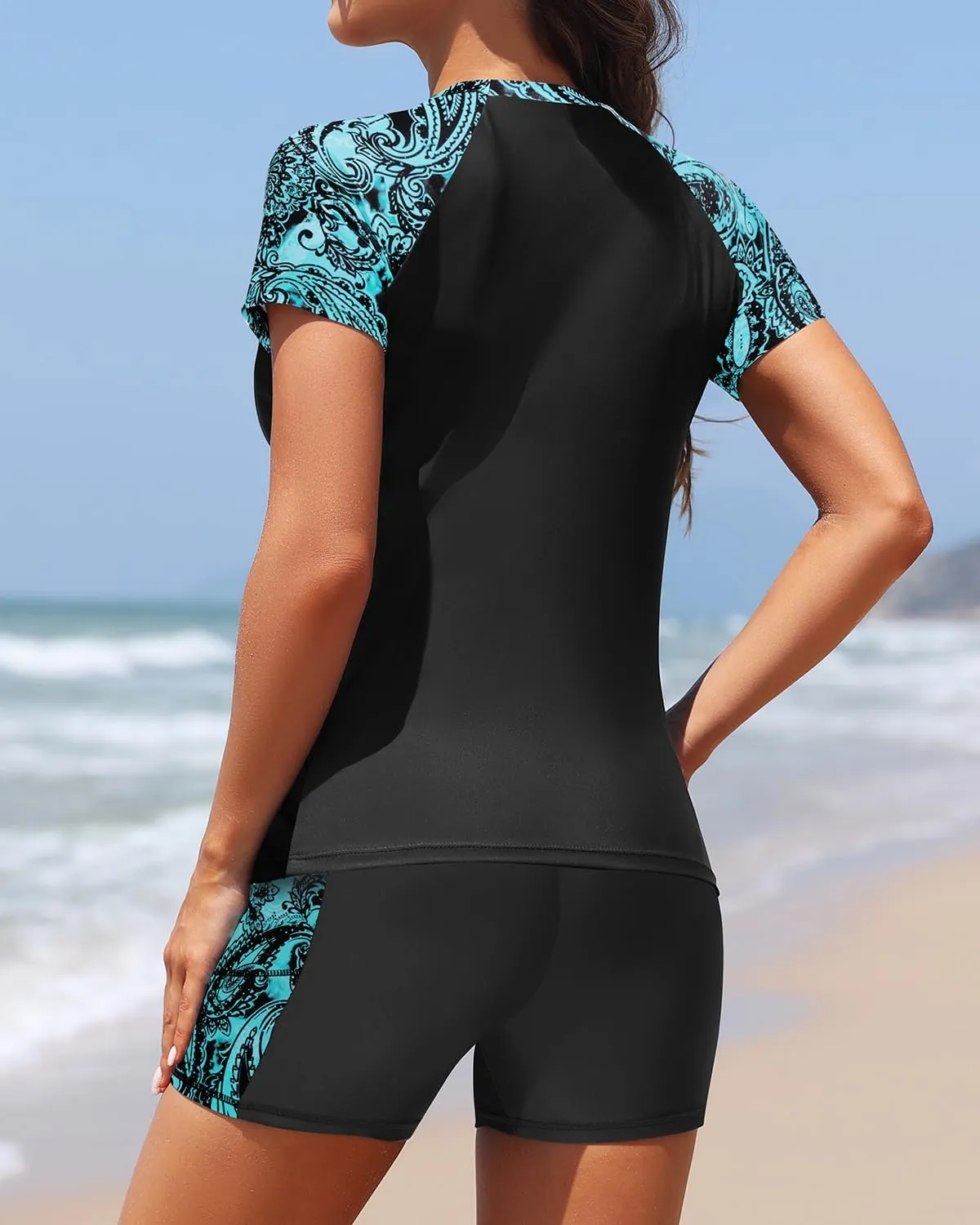 Daci Women's Two Piece Rash Guard - Short Sleeve Swim Shirt with Built-in Bra and Shorts with Pockets